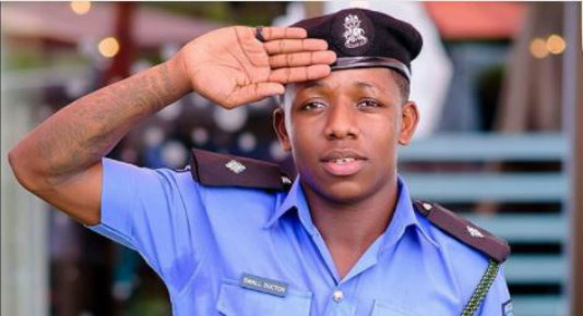Small Doctor in the uniform of the Nigerian Police
